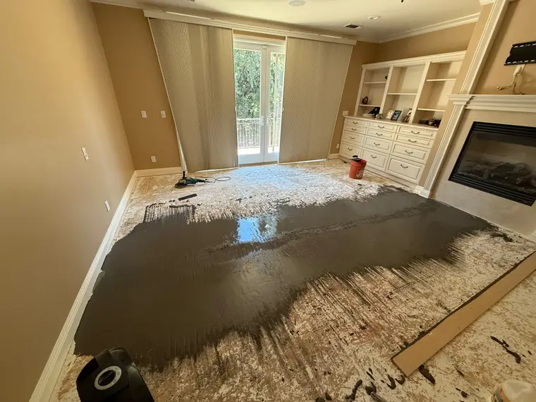 Before: Master bedroom leveled and finished with wide plank luxury vinyl