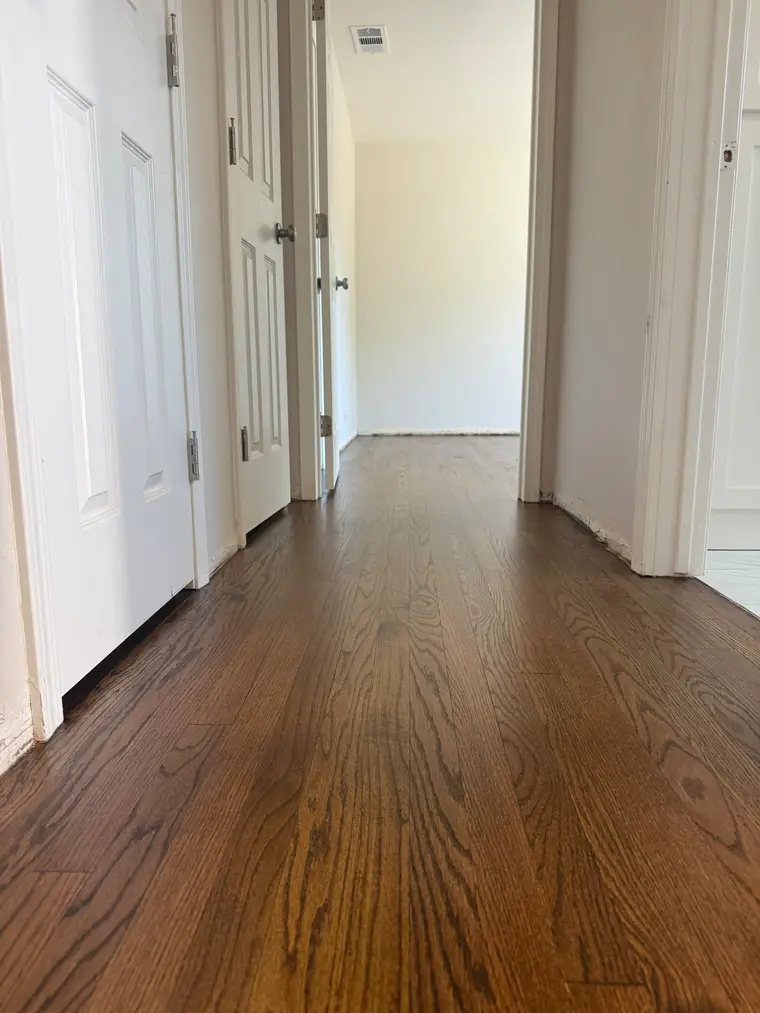 After: Scratched and dulled hardwood brought back to a smooth satin finish
