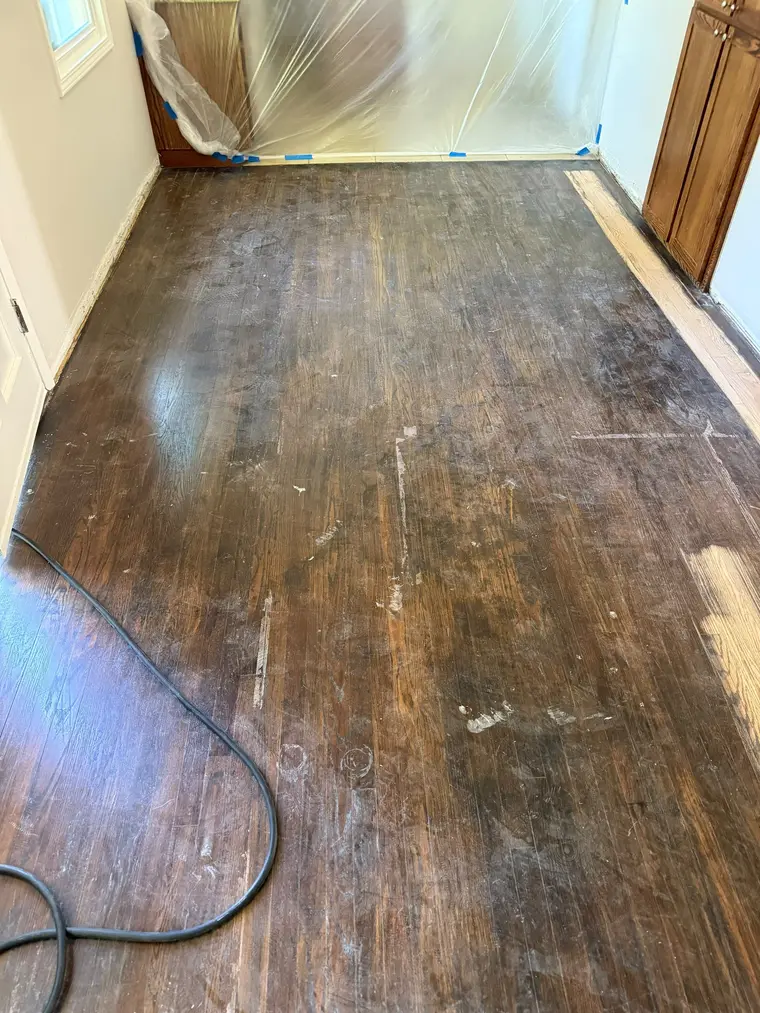 Before: Scratched and dulled hardwood brought back to a smooth satin finish